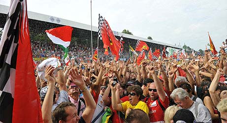 cheering fans with flags at monza gp